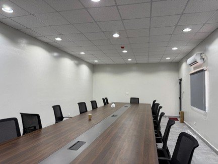 Boardroom with long table and chairs