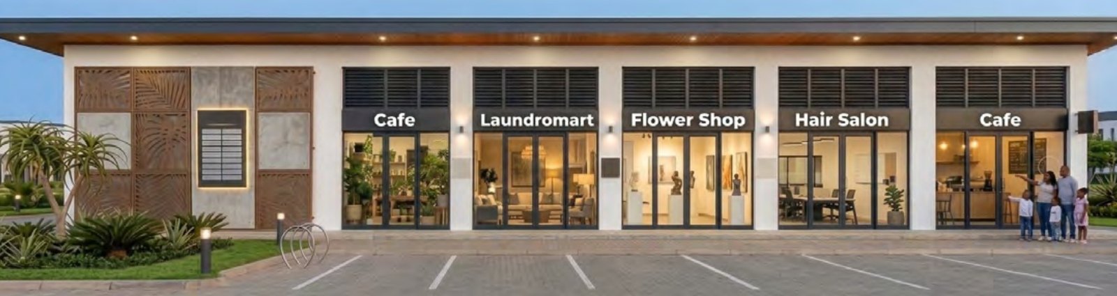 Row of shopfronts with café, laundromat, flower shop and hair salon